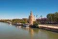 Golden tower Torre del Oro along the Guadalquivir river, Seville Andalusia , Spain. Royalty Free Stock Photo