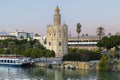 Golden tower Torre del Oro at sunset from the other side of the Guadalquivir river, Seville Andalusia, Spain Royalty Free Stock Photo