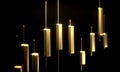 Golden Trading Candles on a Black Studio Background. Business Concept.