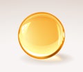 Golden trasparent resine ball - realistic medical pill or honey drop or glass sphere Royalty Free Stock Photo