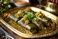 A golden tray of warak enab with stuffed grape leaves. Royalty Free Stock Photo