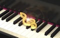 Shining golden treble clef on the piano keyboard 3d illustratio Royalty Free Stock Photo