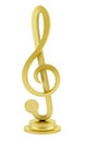 Golden treble clef statuette isolated on white Royalty Free Stock Photo