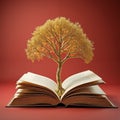 Golden tree grows from open old book on red background. Knowledge and wisdom. Education and learning concept. Metaphor for Royalty Free Stock Photo
