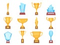 Golden trophy cups. Glass and gold award trophies for sports or competition. Crystal championship rewards and winner