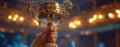 The golden trophy held high in celebration of a remarkable achievement. AI generated image Royalty Free Stock Photo