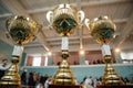 Golden trophys set standing on the table. Competition at the background Royalty Free Stock Photo