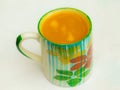 Golden turmeric milk juice in cup Royalty Free Stock Photo