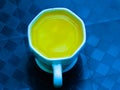 Golden turmeric milk juice in cup Royalty Free Stock Photo