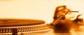 Golden turntable headshell and platter dots, macro view Royalty Free Stock Photo