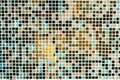 Golden, turquoise, beige mosaic tiles background. small square tiles form mosaic pattern, elegance and richness. luxurious design