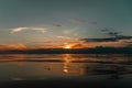 Golden twilight. Dramatic skies under evening sea