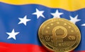 Golden Petro concept coin on Venezuelan flag. Petro - the cryptocurrency of Venezuela concept. 3D Rendering Royalty Free Stock Photo