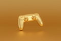 Golden video game controller on golden background. Gaming concept
