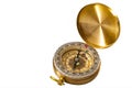 Golden vintage brass compass isolated on white background with a clipping path and copy space Royalty Free Stock Photo