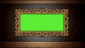 Golden vintage frame on brick wall. Design retro element. Green screen Royalty Free Stock Photo