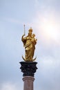 Golden Virgin Mary on the central square Marienplatz in Munich, Germany Royalty Free Stock Photo