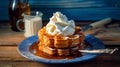 Golden Waffle with Maple Syrup and Whipped Cream on Vintage Blue Plate Royalty Free Stock Photo