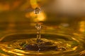 Golden water drops Royalty Free Stock Photo