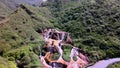 Golden Waterfall over rust-colored rocks & soil taiwan