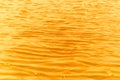 Golden wave texture (wave surface of sea). Royalty Free Stock Photo
