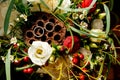 Golden wedding rings of bride and groom lie on lush flower bouquet Royalty Free Stock Photo