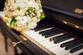 Golden wedding rings lie on the piano Royalty Free Stock Photo