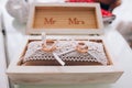 Golden wedding rings in a white wooden box. Wedding decoration. Symbol of family, unity and love Royalty Free Stock Photo