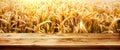 Golden wheat field with wooden table