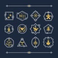 Golden and white line Christmas emblems motifs set on navy blue background Royalty Free Stock Photo