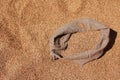 golden whole grains in jute sack on wheat grains backround. Harvesting cereals. Ingredient for making bread. agriculture