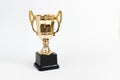 Golden Winner prize Cup on White background.