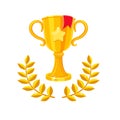 Golden winner's cup with laurel wreath. First place award. Symbol of award ceremony.