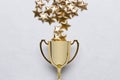 Golden winner trophy cup with golden stars
