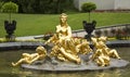 Golden Woman and children statue at Linderhof Palace garden in Bavaria, Germany Royalty Free Stock Photo