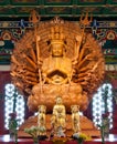 Golden Wood Statue of Guan Yin with 1000 hands Royalty Free Stock Photo