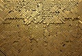 Golden woven texture intricate pattern geometric design close-up detailed interlocking lines warm lighting textured surface high Royalty Free Stock Photo
