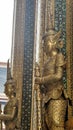 Golden Yaksa giant in full decoration guarding royal temple