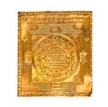 Golden yantra on white.Manufactured