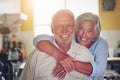 Golden years make for golden love. Portrait of a happy senior couple spending time together at home. Royalty Free Stock Photo