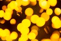 Golden yellow abstract background with bokeh defocused blurred lights. Royalty Free Stock Photo