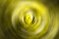 Golden yellow blurred gradient radial motion background. Mixed circular texture