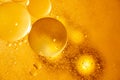 Golden yellow bubble oil, abstract