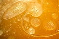 Golden yellow bubble oil or serum