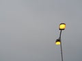 golden yellow electric pole and blue sky gray white clouds Royalty Free Stock Photo