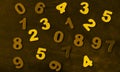 Golden yellow numbers background on blackboard top view