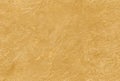 Golden yellow seamless venetian plaster background stone texture. Traditional venetian plaster stone texture grain pattern drawing