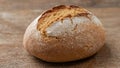 GoldenBrown Round. Textural Study of Light and Shadow on a Singular Loaf. Royalty Free Stock Photo