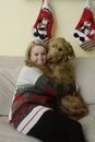 Goldendoodle Hugging Woman