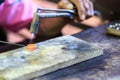 Goldsmith making ring